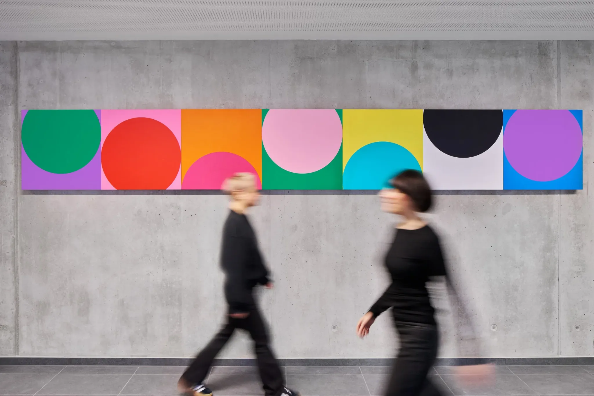 Colourful geometric wall artwork in the We Play sports centre